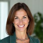 Portrait of Dr. Elara Vance, a warm, professional woman.